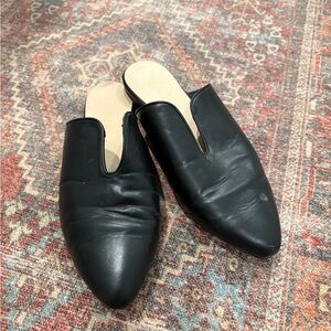 Restricted Black Leather Flats